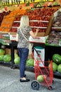 NYC: Woman Shopping for Fresh Fruit