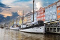 Nyhavn Harbour with vessels at sunset