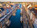 Nyhavn New Harbour canal and entertainment district in Copenhagen, Denmark. The canal harbours many historical wooden Royalty Free Stock Photo