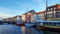 Nyhavn waterfront, canal, colorful facades of old house reflection, and buildings, ships, yachts and boats in Copenhagen, Denmark Royalty Free Stock Photo