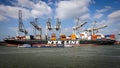 Nyk Line container ship shipping terminal crane Royalty Free Stock Photo