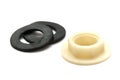 A nylon hex hexagonal plumbing lock nut and a pair of black rubber gaskets seals Royalty Free Stock Photo