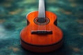 Nylon string guitar resting on a textured surface creating a captivating visual display Royalty Free Stock Photo