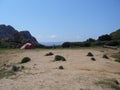 Nylon tent erected for camping vacation near the beach and coast, Sardinia, Italy