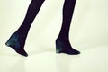 Nylon tights. shoes and black tights on slim legs of girl Royalty Free Stock Photo