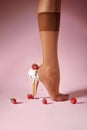 Nylons, stay-up, tights, hosiery, hose, pantyhose socks summer collection on pink background as a heel creative dessert ice cream