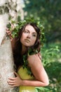 Nymph hugging a tree Royalty Free Stock Photo