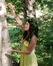 Nymph singing to a tree Royalty Free Stock Photo