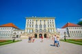 Nymphenburg, Germany - July 30, 2015: Beautiful palace building as seen from outside front view, royal architecture with golden de