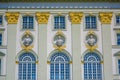 Nymphenburg, Germany - July 30, 2015: Closeup palace facade showing large windows and several bust sculptures with