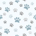 Cute boyish paw prints on seamless pattern. Royalty Free Stock Photo