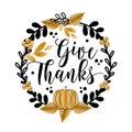 Give Thanks - greeting in pumpkin and leaf wreath.