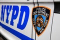 NYPD Sign with Logo on Police Patrol Car in New York City. USA Royalty Free Stock Photo