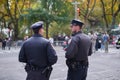 NYPD Police Officers standing on side of road providing security for Veterans Day