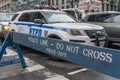 NYPD police vehicle and do not cross traffic barricade Royalty Free Stock Photo
