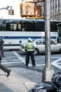 NYPD traffic control officer seen on the busy streets of New York in a typical busy time of day. Royalty Free Stock Photo