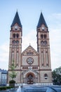 NyiregyhÃÂ¡za`s Roman Catholic church with the newly built fountain in the foreground