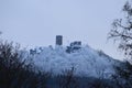 NÃÂ¼rburg, Germany - 12 29 2020: backside of the NÃÂ¼rburg in winter with snowy forest