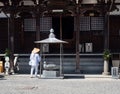 O-henro Buddhist pilgrim in white robes at Kichijoji, temple number 63 of Shikoku Royalty Free Stock Photo