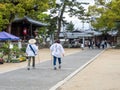 O-henro pilgrims on the grounds of Zentsuji, temple number 75 of Shikoku pilgrimage Royalty Free Stock Photo