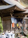 O-henro pilgrims reading sutras at Iwayaji, temple number 45 of Shikoku pilgrimage Royalty Free Stock Photo