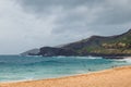 Oahu beach with people swimming in big waves Royalty Free Stock Photo