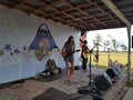 Taimane and band playing at Hawaii Polo Club