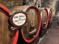 Oak barrels in an old underground wine cellar