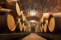 Oak barrels in a underground wine cellar Royalty Free Stock Photo