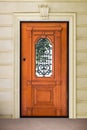 Oak door with forged peephole Royalty Free Stock Photo
