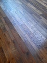 An oak floor with a distinctive pattern complemented by smaller