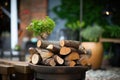 oak logs piled by a cast iron fire pit Royalty Free Stock Photo