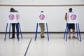 Oak View, California, USA, November 4, 2014, citizen votes in election booth polling station in gymnasium