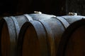 Oak wine barrel in wine cellar with soft light Royalty Free Stock Photo