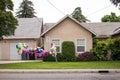 OAKDALE, CALIFORNIA / USA - APRIL 29, 2020: Happy Birthday balloons decorate a front yard of a home