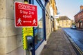 OAKHAM, RUTLAND, ENGLAND Ã¢â¬â December 31 2020: Rutland County Council coronavirus hand sanitising point in and covid-19 social