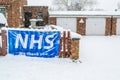 OAKHAM/RUTLAND, ENGLAND- 24 JANUARY 2021: `NHS we thank you` banner ouside a house in Oakham, Rutland, England Royalty Free Stock Photo