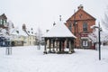 OAKHAM/RUTLAND, ENGLAND- 24 JANUARY 2021: The old Town Pump in Oakham market place on a snowy day