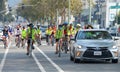 Unidentified protestor in cars and bicycle caravan promoting prop 15