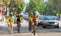 Unidentified protestor in cars and bicycle caravan promoting prop 15