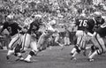 Oakland Raiders RB Hewritt Dixon #35 takes handoff from Daryle Lamonica