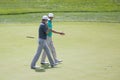 OAKMONT, UNITED STATES - Oct 26, 2020: Professional Golfers Jordan Spieth and Zac Johnson at the US Open Championship walking on a