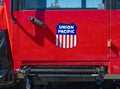 Oakridge, Oregon, USA - May 14, 2023: The Union Pacific logo is painted on the red door of a utility vehicle at the railyard