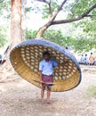 An oar man with his coracle on his back Royalty Free Stock Photo