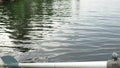 Oar in the oarlock. Hand fishing rod. Evening fishing Lake Lososinnoye Karelia. Pike habitat. Waiting for fish to bite