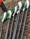 Oars laid out on a quayside