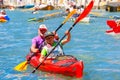 Oarsmen in the Venice Vogalonga regatta, Italy.