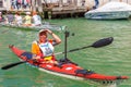 Oarsmen in the Venice Vogalonga regatta, Italy.