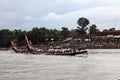 Oarsmen wearing traditional dress participate in the boat race