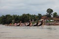 Oarsmen wearing traditional dress participate in the boat race